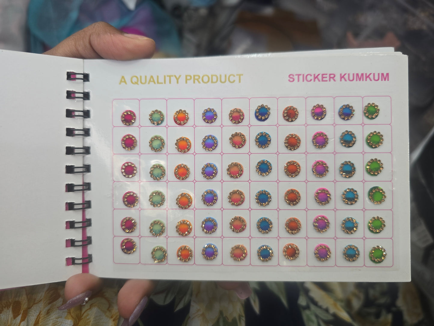 Beautiful designer gold stone tikka/bindi book