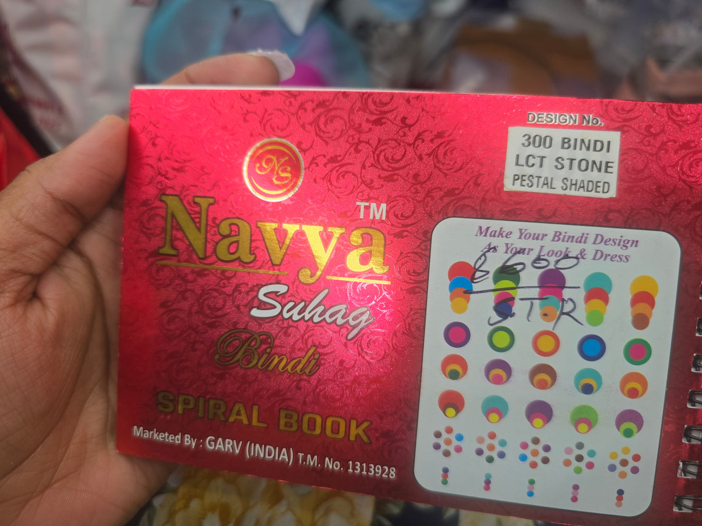 Beautiful designer gold stone tikka/bindi book