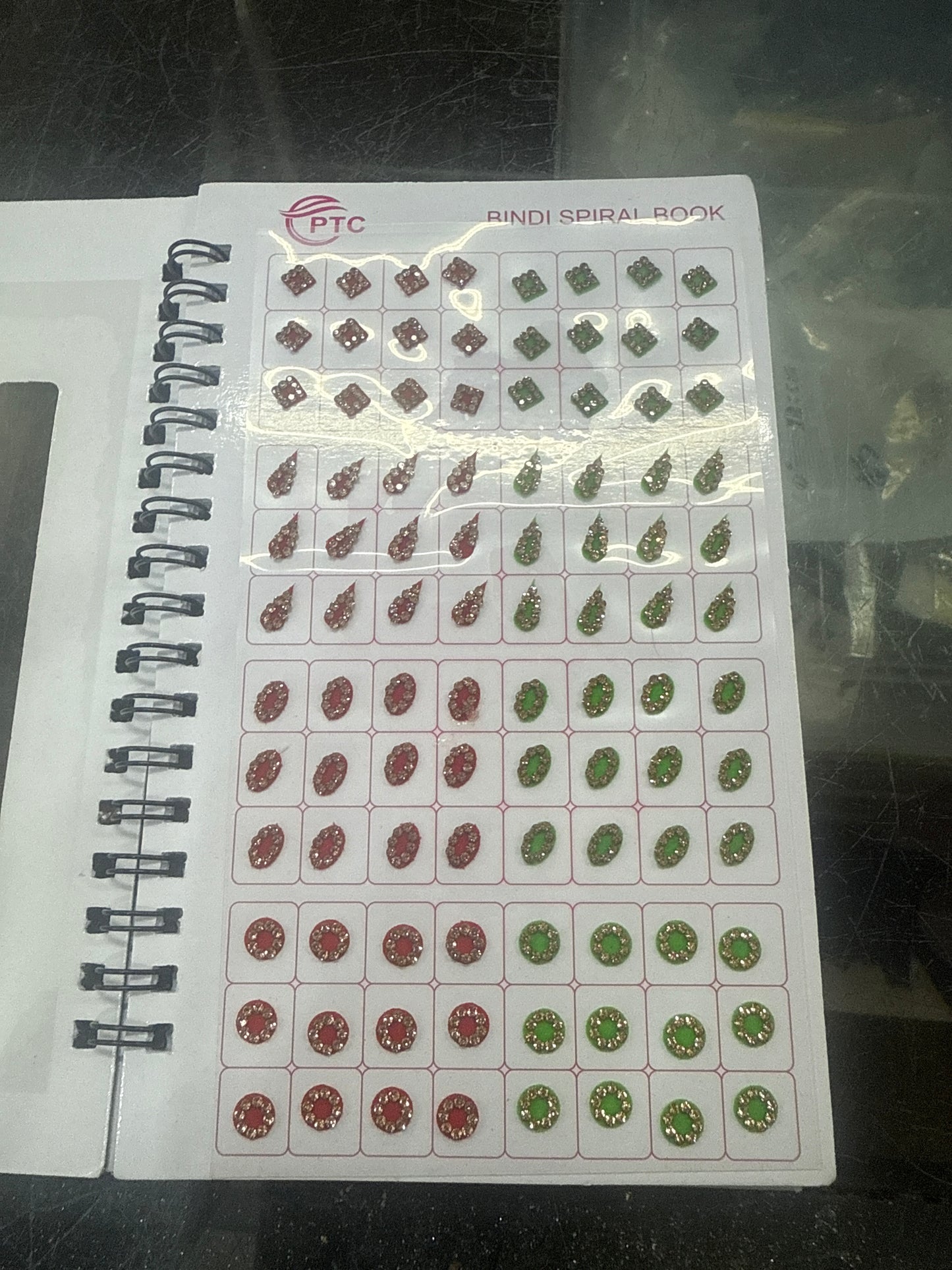 Beautiful designer gold stone tikka/bindi book