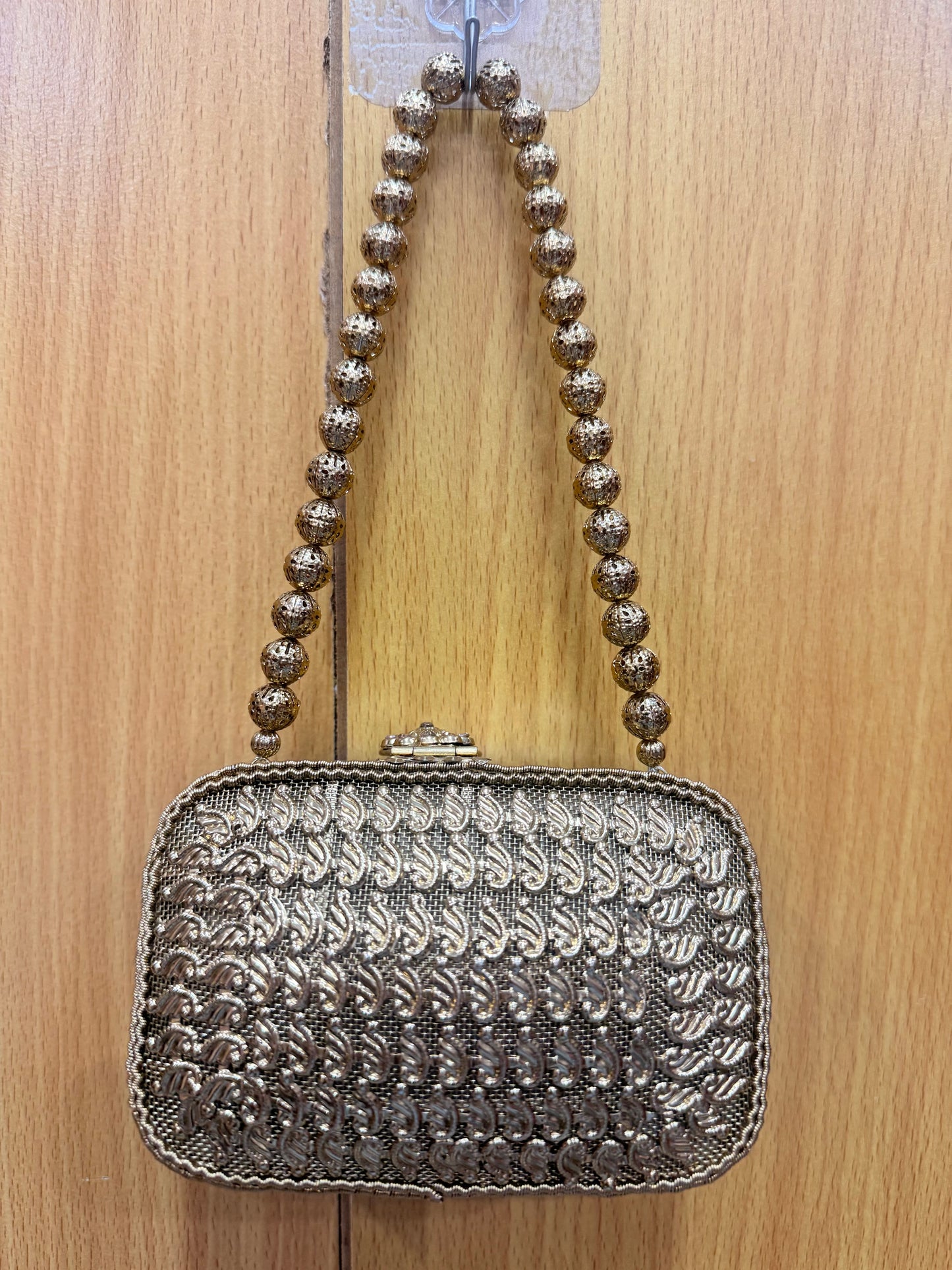 Beautiful designer mini metal clutch