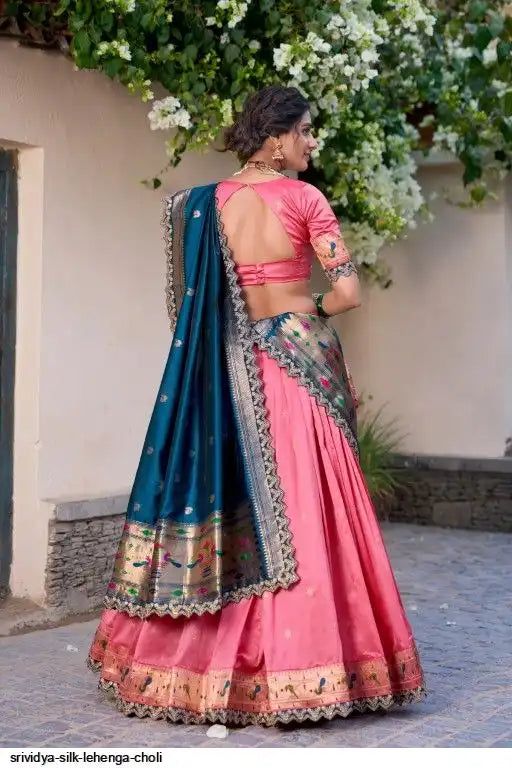 Beautiful designer lengha choli with matching potli