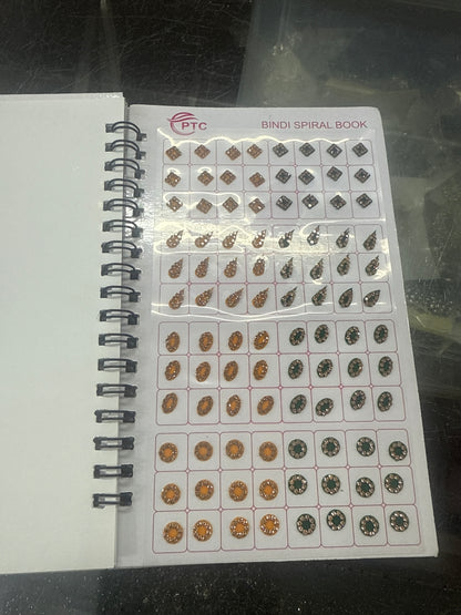 Beautiful designer gold stone tikka/bindi book