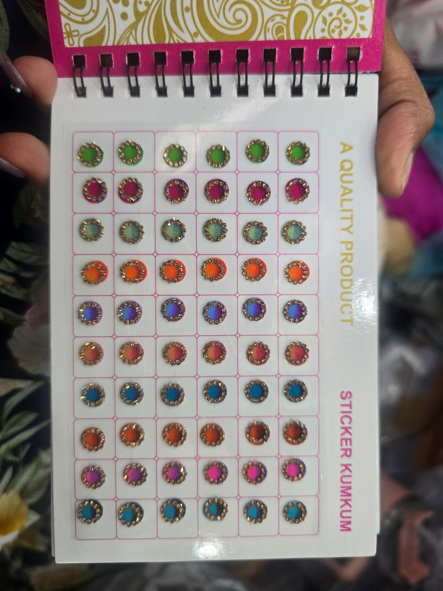 Beautiful designer gold stone tikka/bindi book
