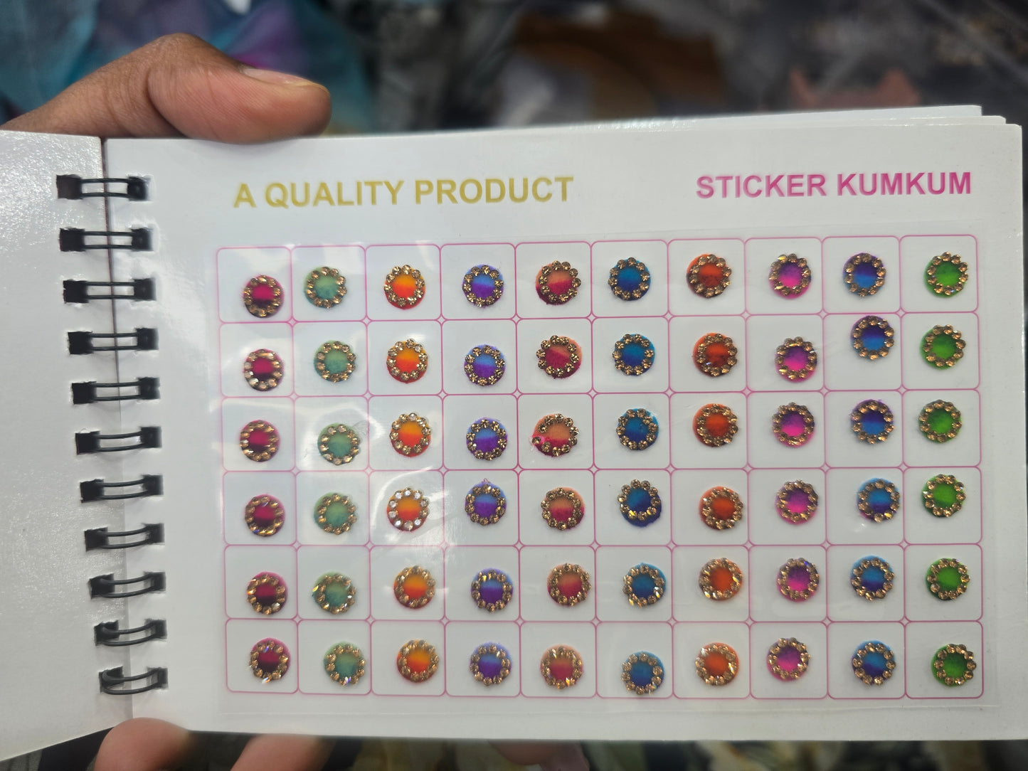 Beautiful designer gold stone tikka/bindi book