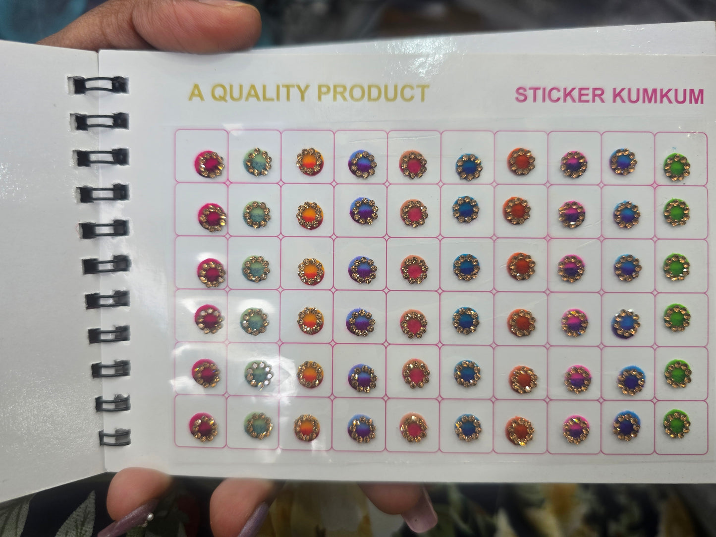 Beautiful designer gold stone tikka/bindi book