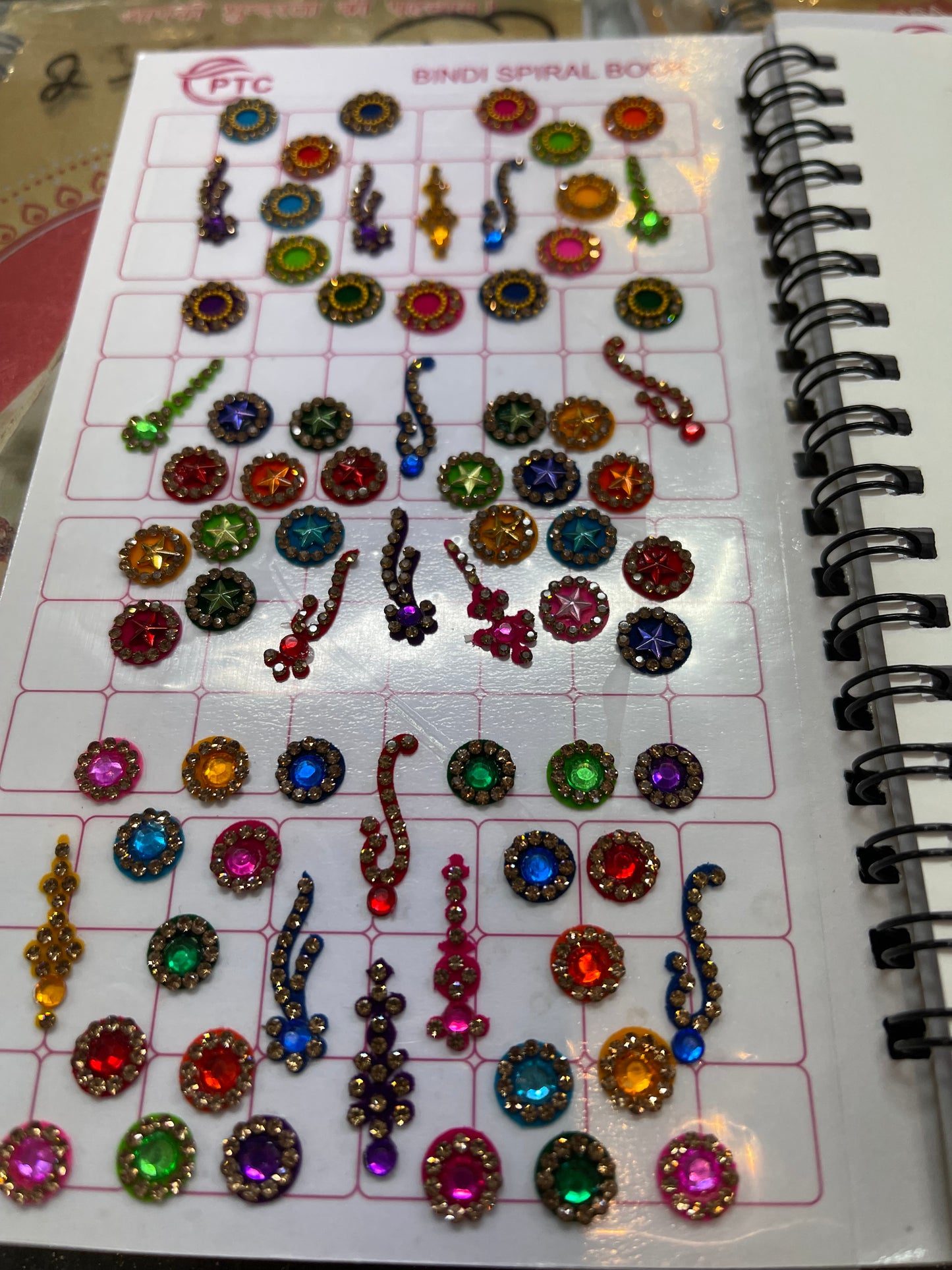 Beautiful designer stone bindi book