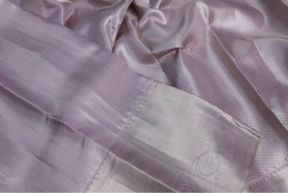Beautiful Pure kanchipuram tissue silk saree pastel lavender shade with allover silver zari woven brocade weaves and silver zari woven border