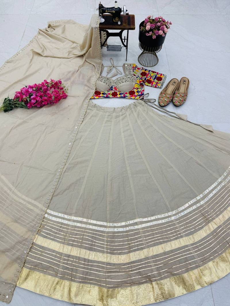 Charming Cream Designer Mal Mal Cotton Lehenga Set With Real Mirror Work For Navratri Wear