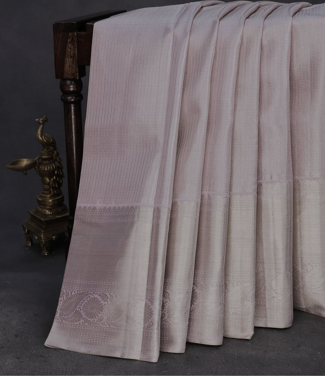 Beautiful Pure kanchipuram tissue silk saree pastel lavender shade with allover silver zari woven brocade weaves and silver zari woven border