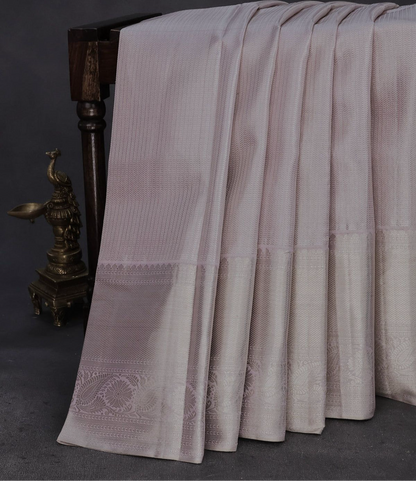 Beautiful Pure kanchipuram tissue silk saree pastel lavender shade with allover silver zari woven brocade weaves and silver zari woven border