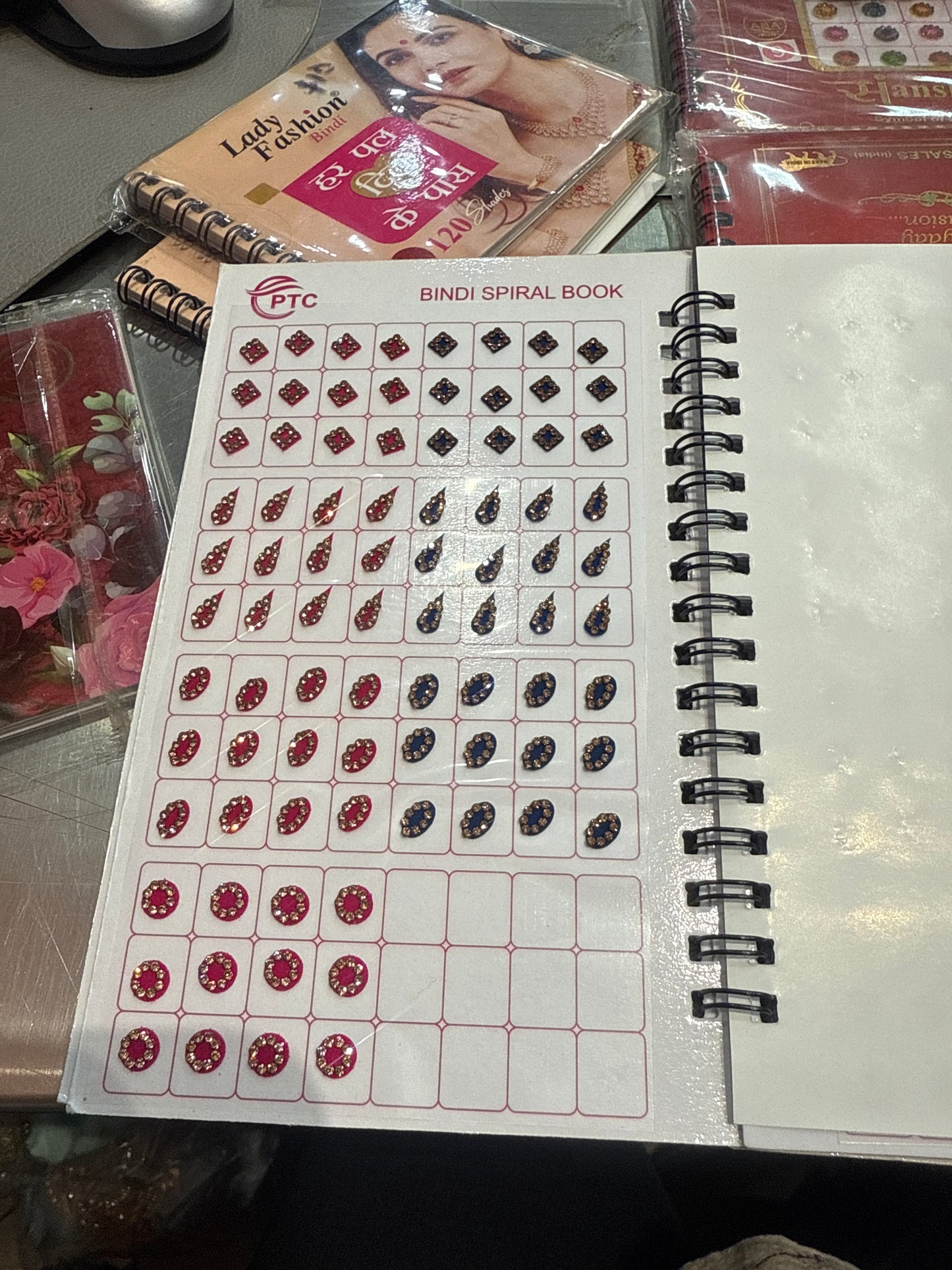 Beautiful designer gold stone tikka/bindi book