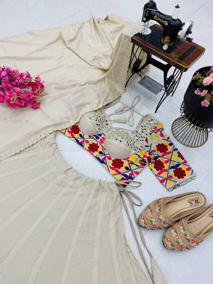 Charming Cream Designer Mal Mal Cotton Lehenga Set With Real Mirror Work For Navratri Wear