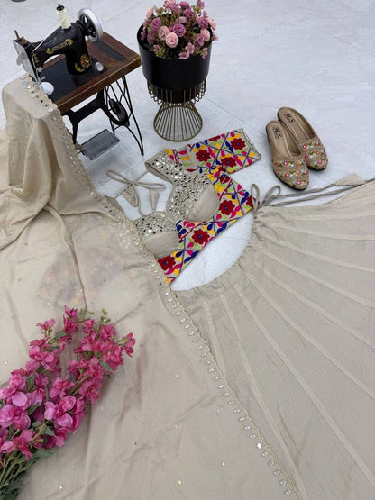 Charming Cream Designer Mal Mal Cotton Lehenga Set With Real Mirror Work For Navratri Wear
