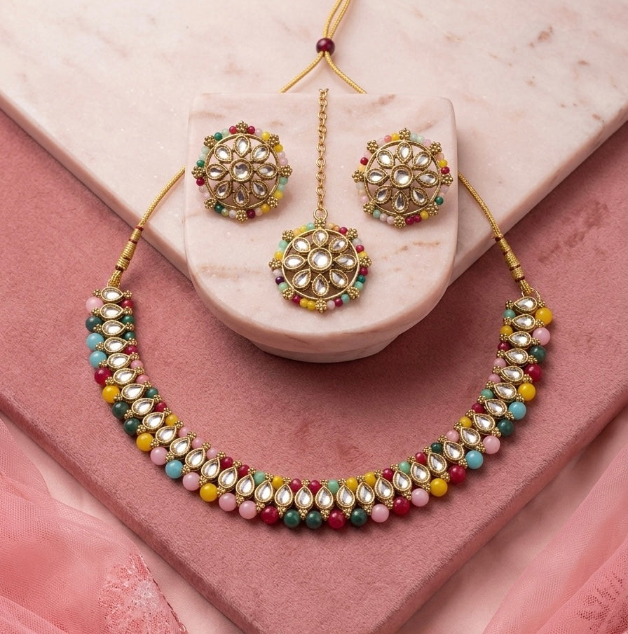 Beautiful designer necklace set with matching studs earrings and tikkah