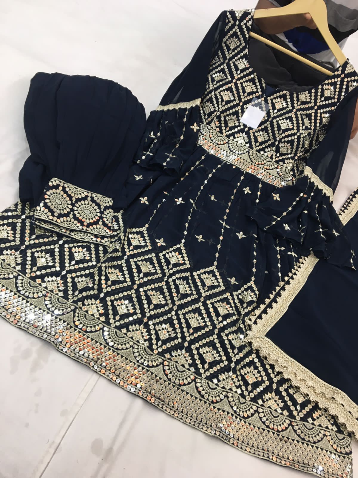 Beautiful designer peplum top with Afghani salwar