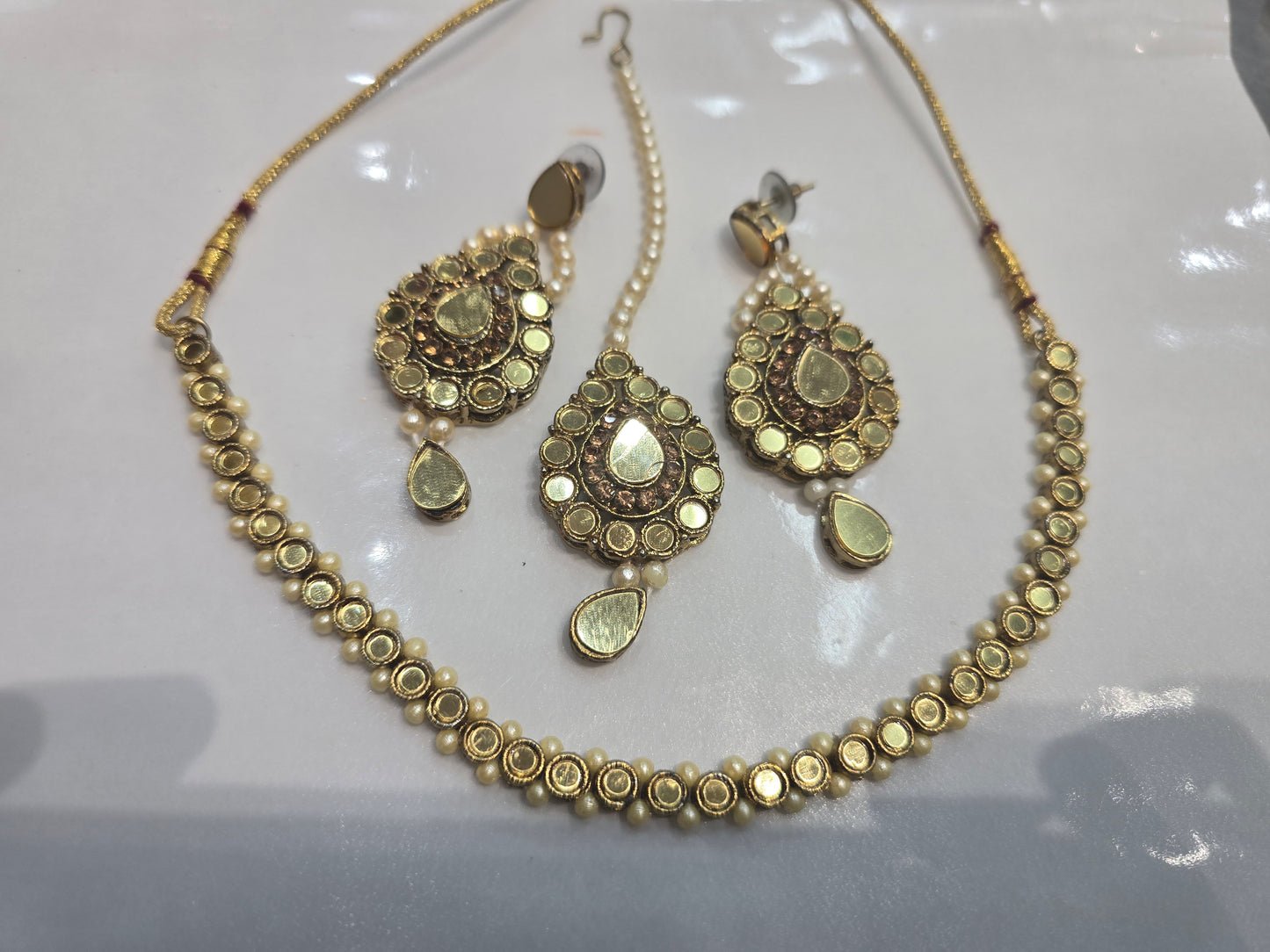Beautiful designer necklace set with earrings and bindi