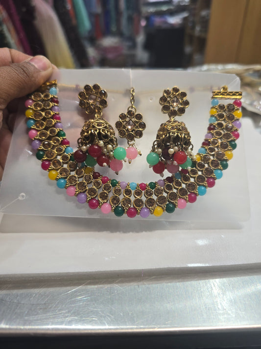 Beautiful designer necklace set with matching jhumki earrings and bindi