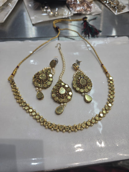 Beautiful designer necklace set with earrings and bindi