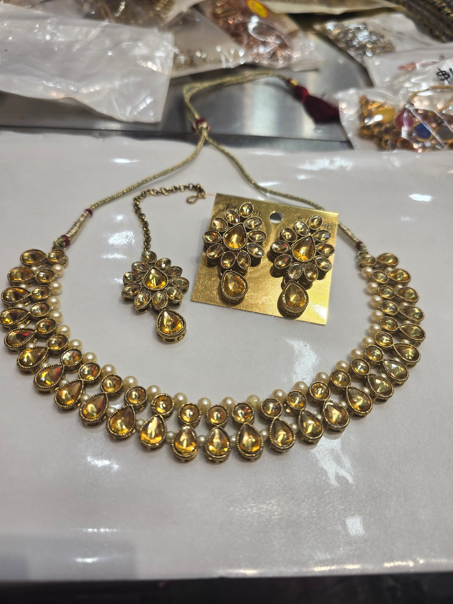 Beautiful designer necklace set with earrings and bindi