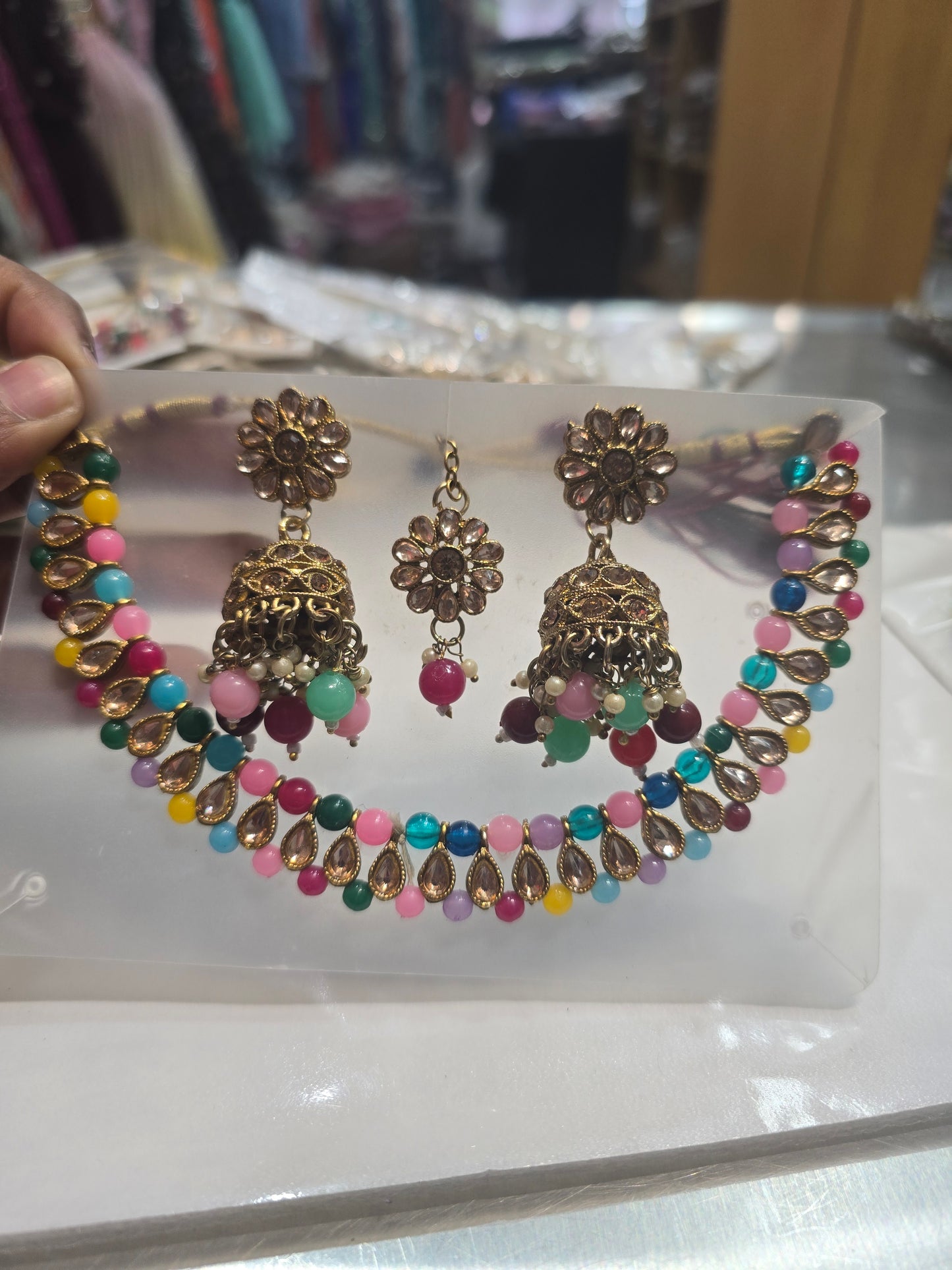 Beautiful designer necklace set with matching jhumki earrings and bindi