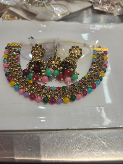 Beautiful designer necklace set with matching jhumki earrings and bindi