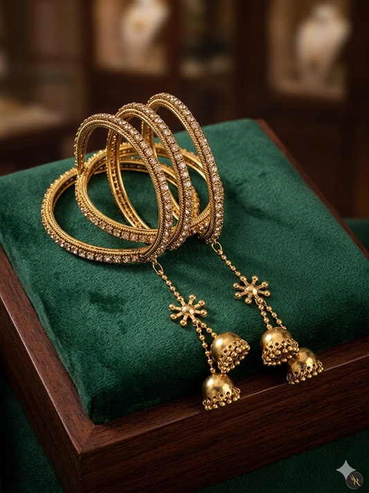 Beautiful metal gold bangles with latkan