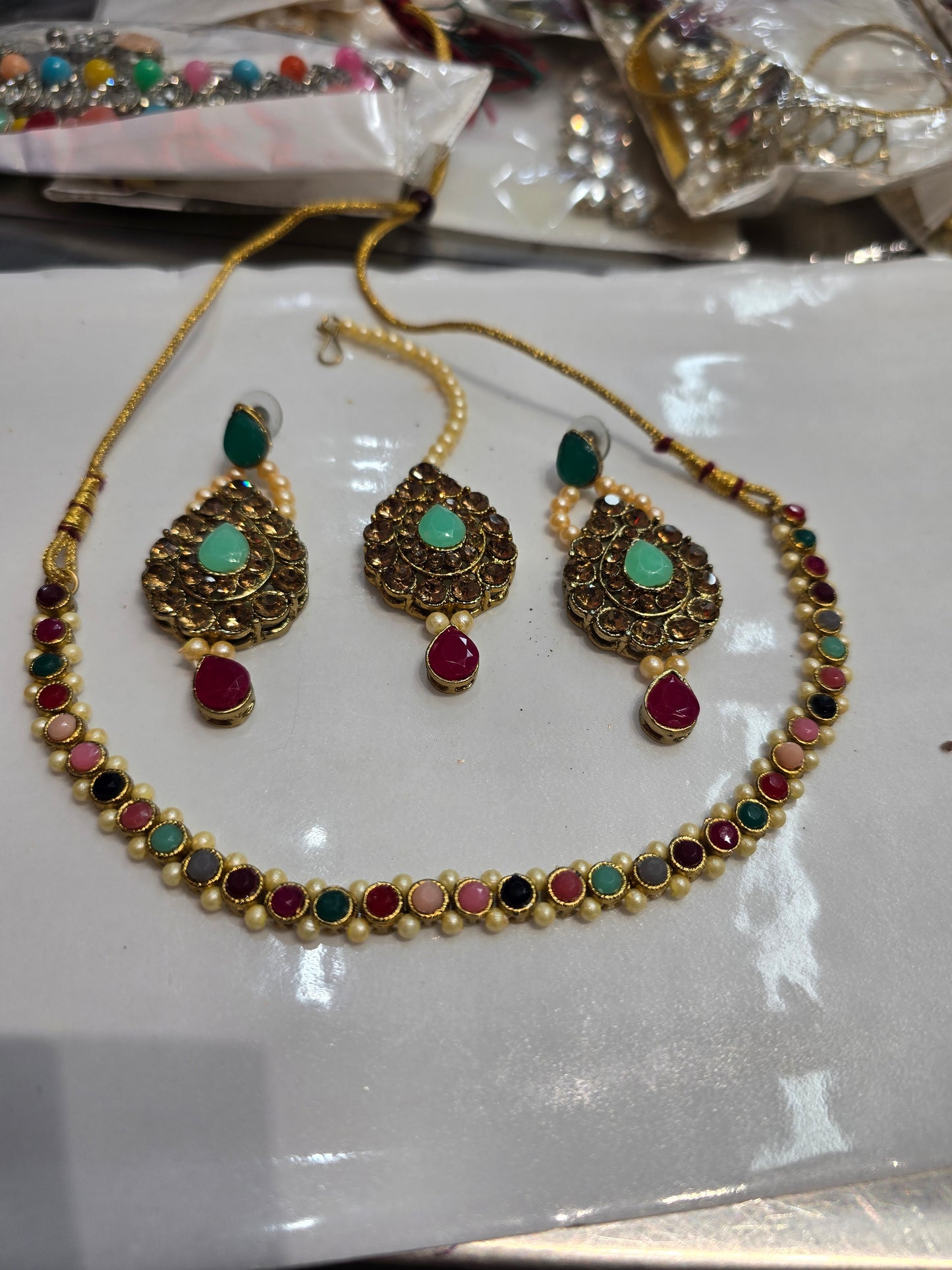 Beautiful designer necklace set with earrings and bindi
