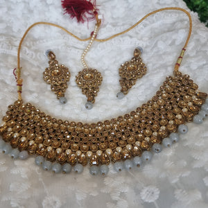 Beautiful designer necklace set with earing and tikkah