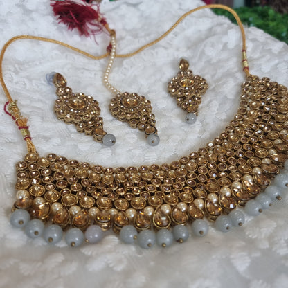 Beautiful designer necklace set with earing and tikkah