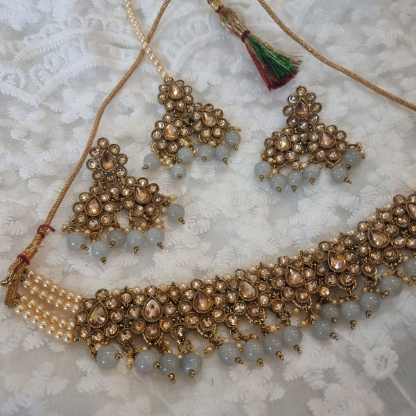 Beautiful designer choker necklace set with earing and tikkah