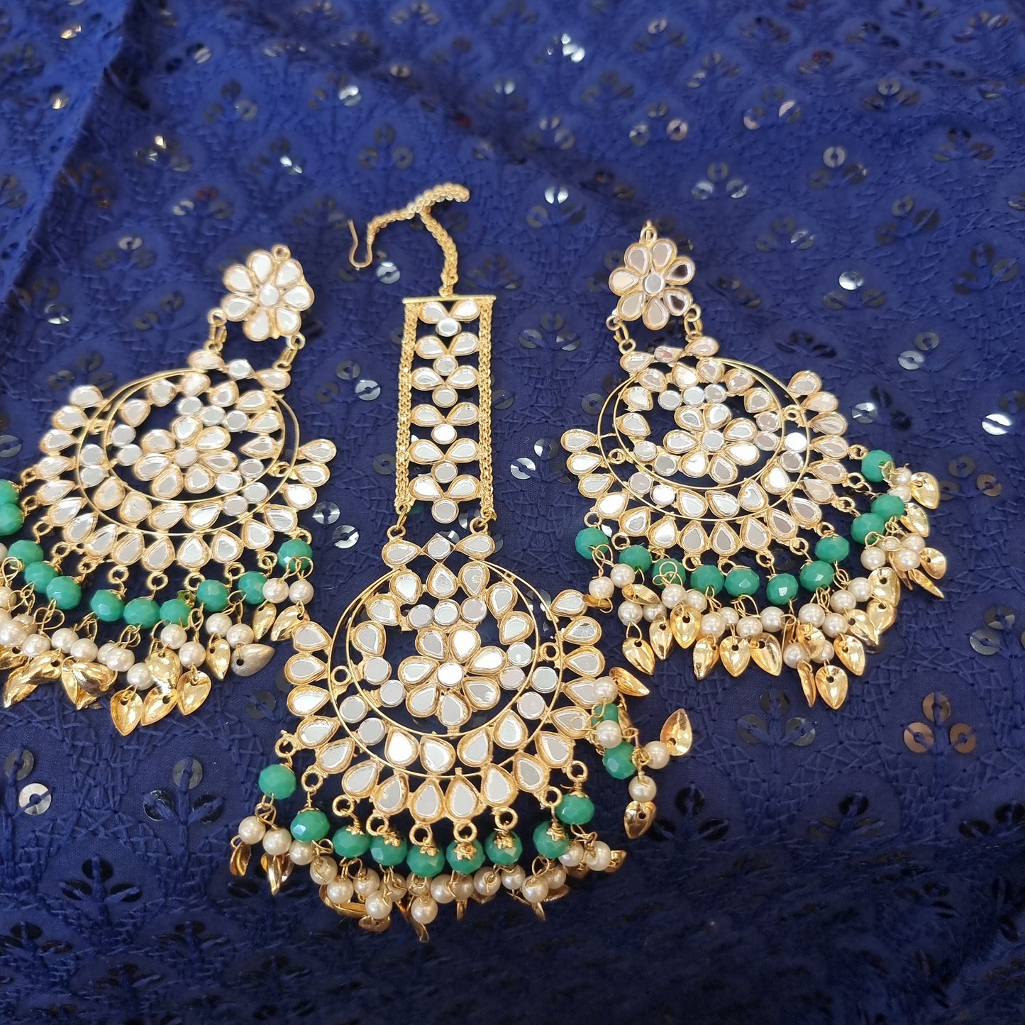 Beautiful designer earing and tikkah set