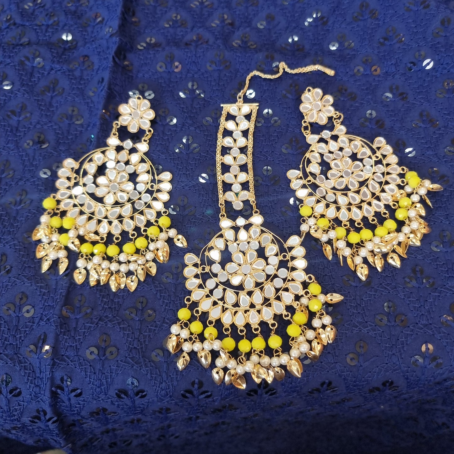 Beautiful designer earing and tikkah set