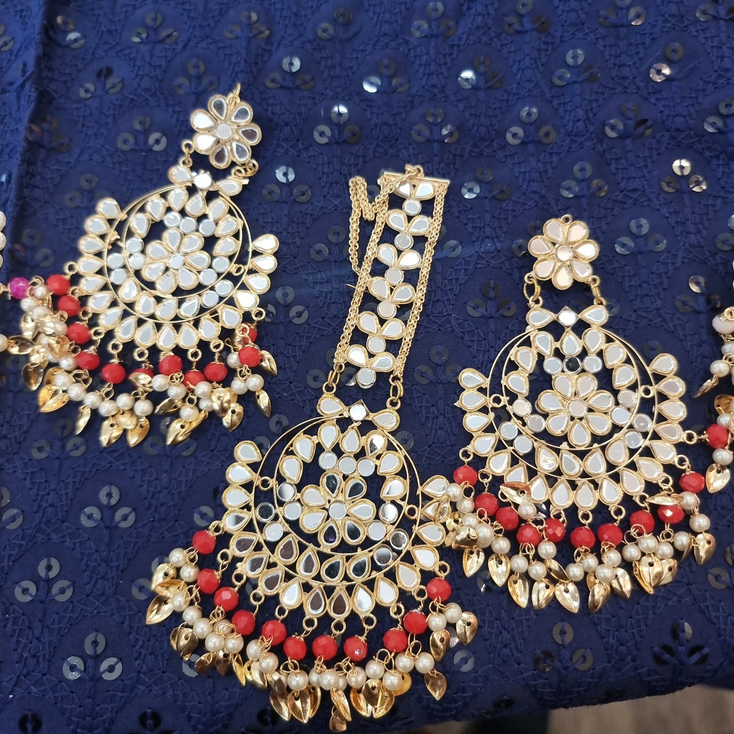 Beautiful designer earing and tikkah set