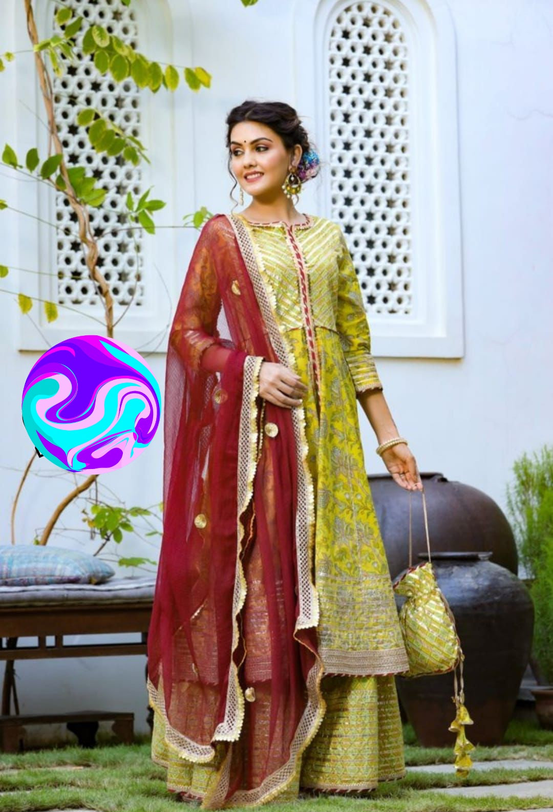 Beautiful designer sharara suit with matching potli