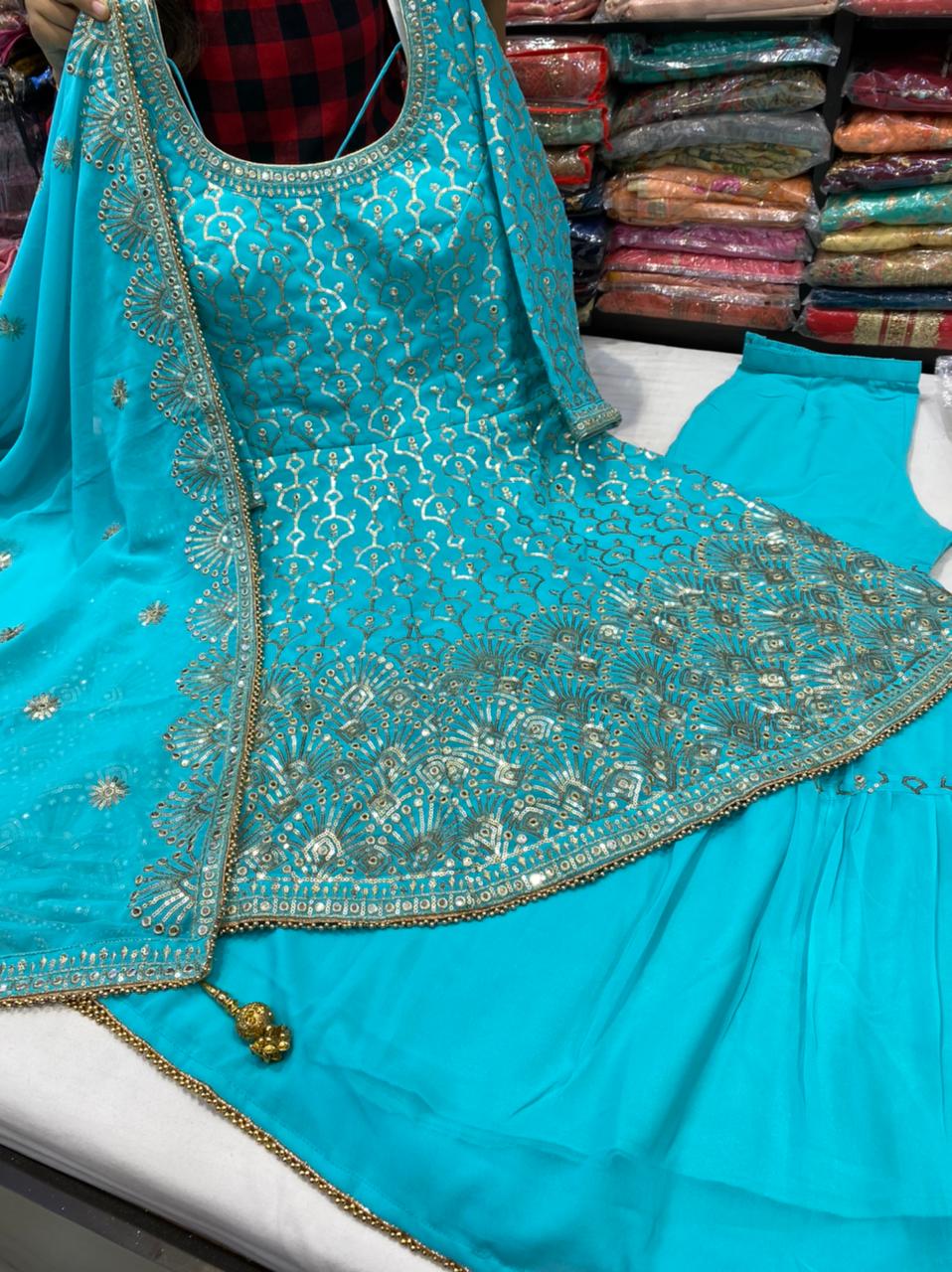 Beautiful designer peplum top with sharara suit