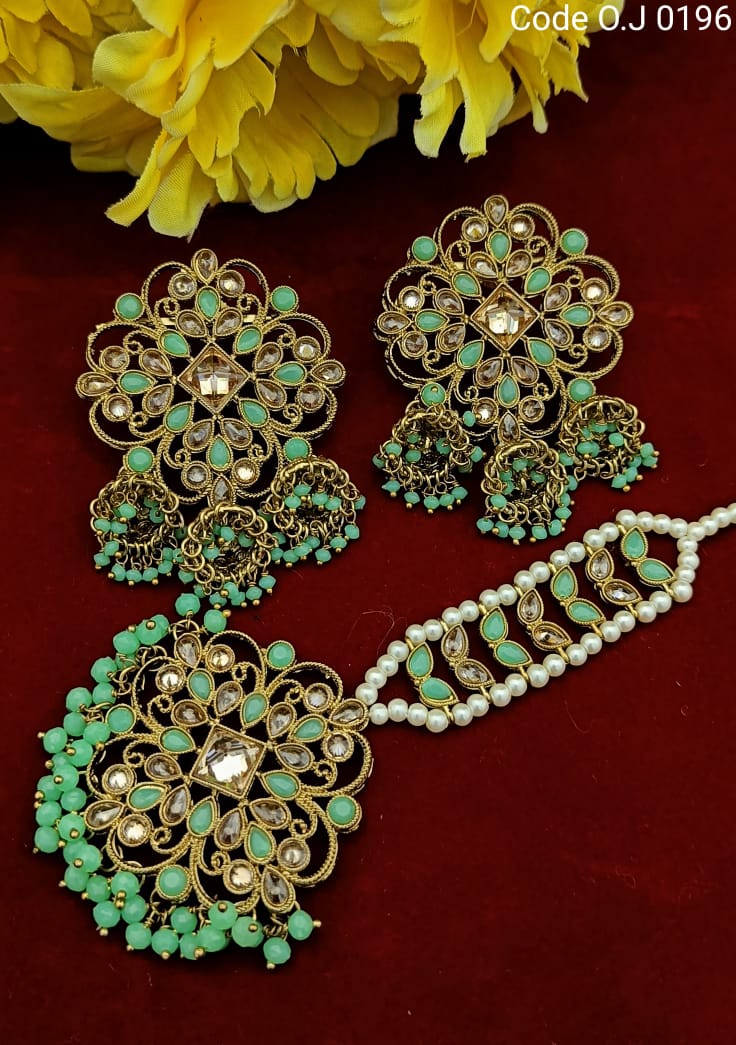 Beautiful designer stud style earrings with bindi/tikka