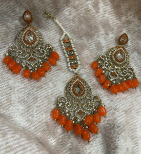 Beautiful designer polki earrings with bindi/tikka