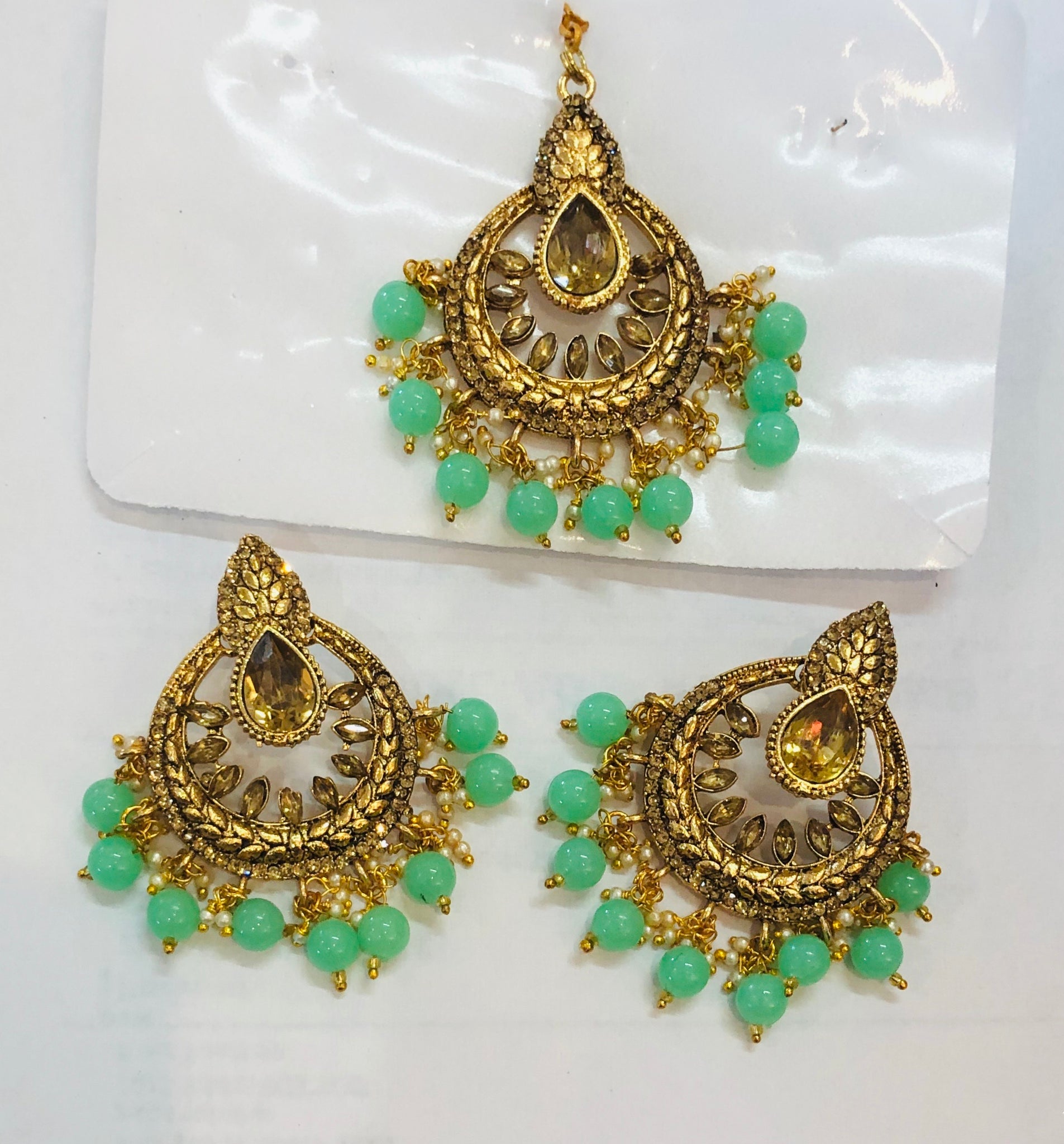 Beautiful designer earrings with bindi/tikka