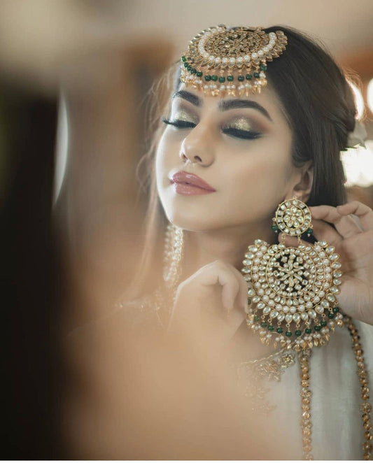 Beautiful designer earrings and tikkah set