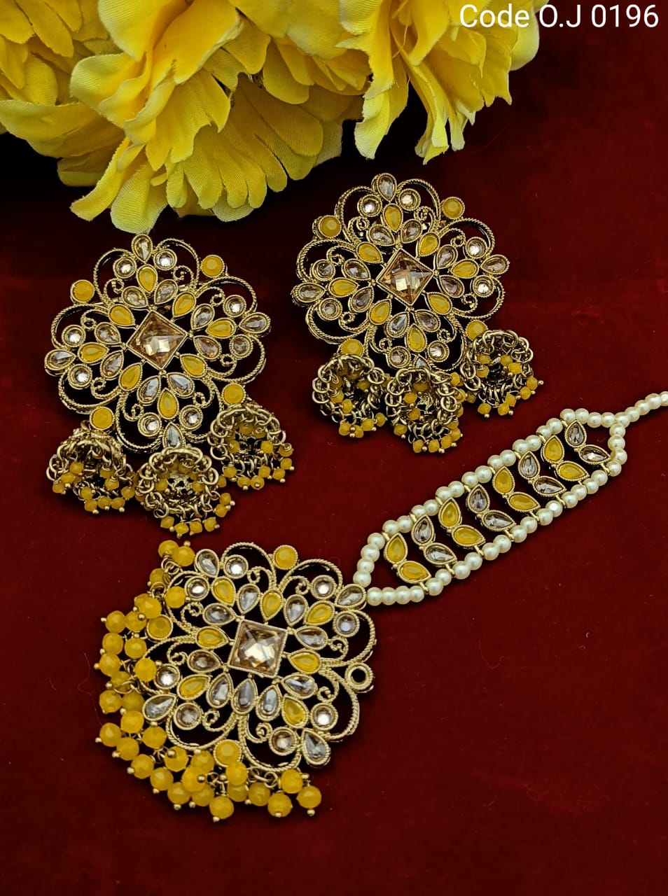 Beautiful designer stud style earrings with bindi/tikka