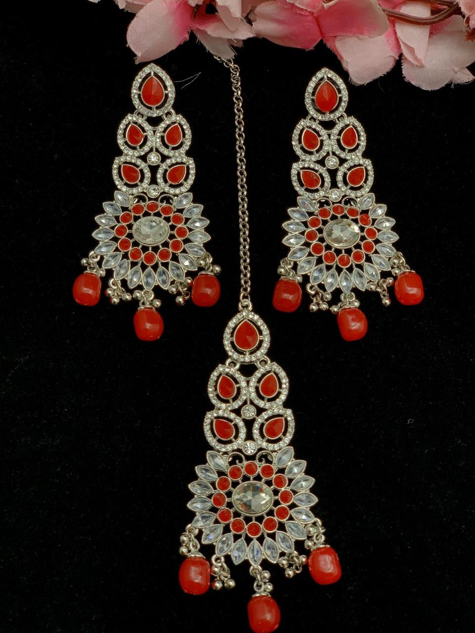 Beautiful designer polki earrings with bindi/tikka